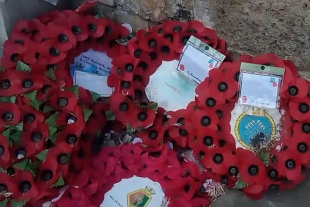 Wreaths are a permanent fixture at the memorial