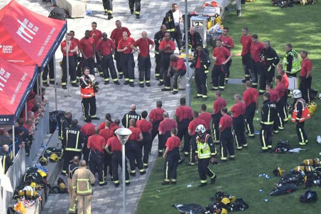 Emergency services close to the scene after a fire engulfed the 24-storey Grenfell Tower in west London