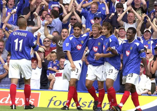 Teddy Sheringham celebrates his goal in Pompey's 2-1 win against Aston Villa on the first day of the 2003-04 Premier League campaign