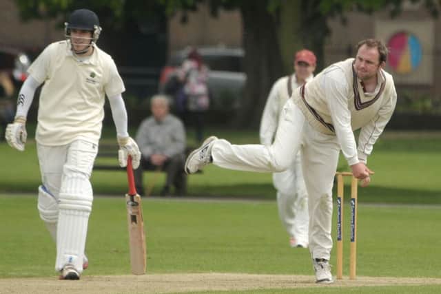 Havant's Stuart Ransley bowls in a previous clash with Burridge. Picture: Mick Young (150640-06)