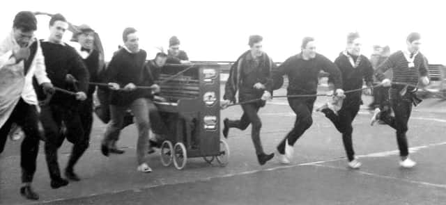 The Portsmouth Grammar School team in full flight, 1965                                              Picture: Tim Runnacles