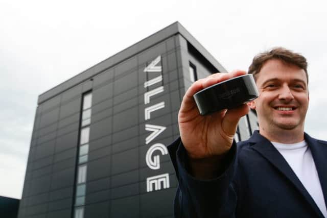 Martin Jordan, Director of Innovation at Equator, with the virtual concierge.