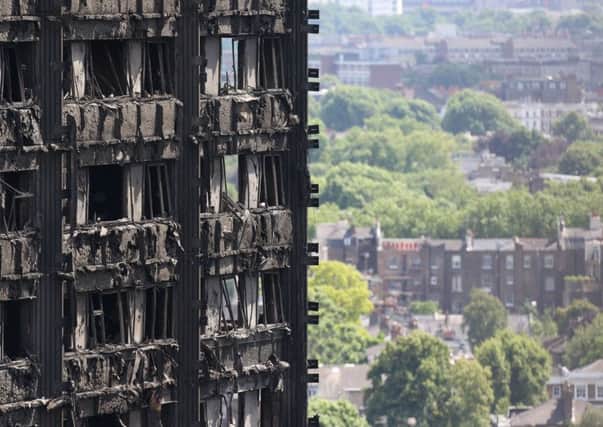 Grenfell Tower in west London after a fire engulfed the 24-storey building Picture: Rick Findler/PA Wire