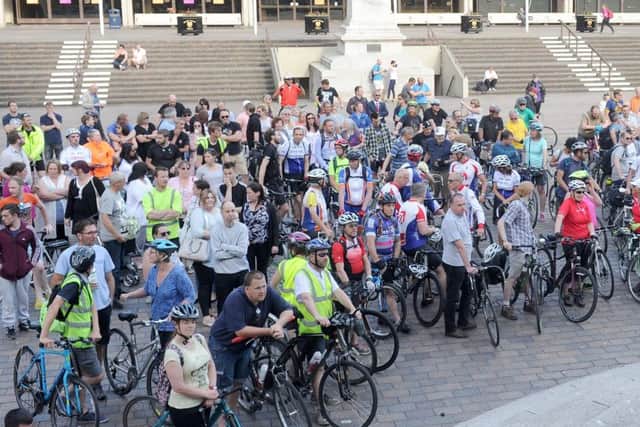 Cyclists at a rally in Guildhall Square on Thursday evening to remember cyclist Tim Atkins, of Kingsley Road, Southsea, who died on the Eastern Road. Picture: Sarah Standing (170783-3575) PPP-170615-214105001