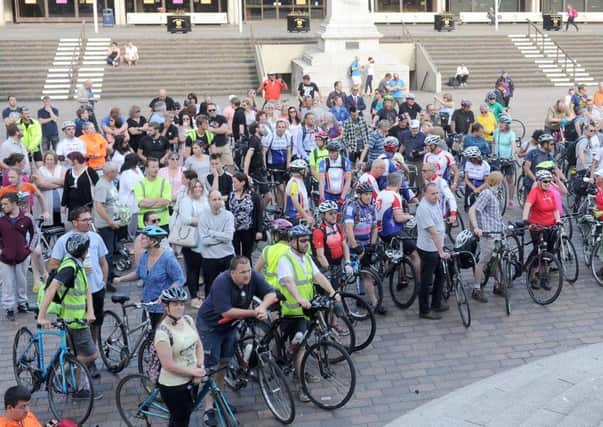 Cyclists at a rally in Guildhall Square on Thursday evening to remember cyclist Tim Atkins, of Kingsley Road, Southsea, who died on the Eastern Road. 

Picture: Sarah Standing (170783-3575) PPP-170615-214105001
