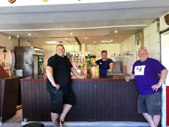 areham Heathens commercial manager Dave Tyson, left, clubhouse bar manager John Cole, middle, and Bernie Rhodes, director of rugby, right, in the clubhouse which is undergoing a revamp.