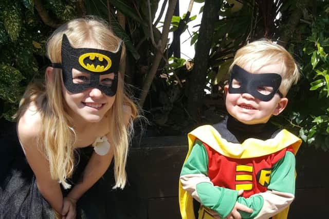 Freya Memmott, eight, as Batgirl and Harrison Memmott, two, as Robin, at Port Solent Comic Con on June 17 PPP-170617-163207001