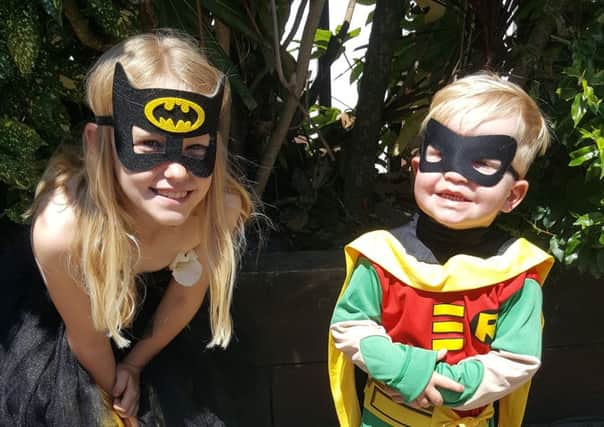 Freya Memmott, eight, as Batgirl and Harrison Memmott, two, as Robin, at Port Solent Comic Con on June 17 PPP-170617-163207001