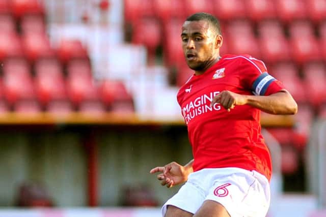 Nathan Thompson in action for Swindon Town