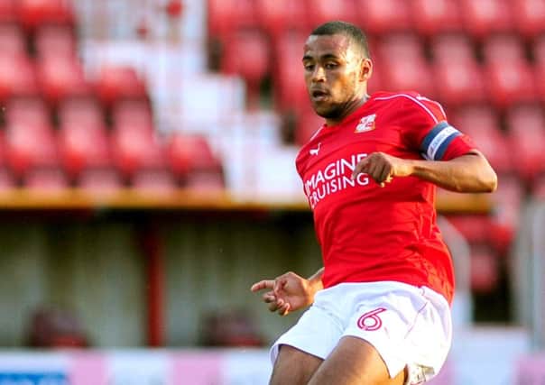 Nathan Thompson in action for Swindon Town