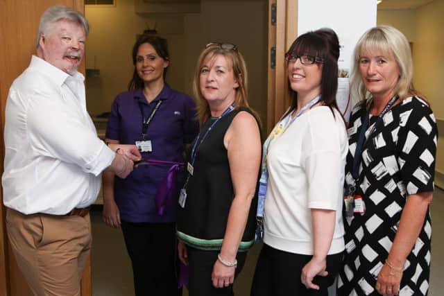 Simon Weston says hello to Andrea Webb - sonographer, Tracey Brodie, diagnostic imaging manager, Charlotte Nichols, lead diagnostic administrator and Penny Daniels, hospital director
(170797-18)