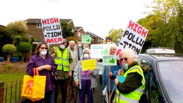 The Parish Ecology Group with anti-pollution placards on their walk