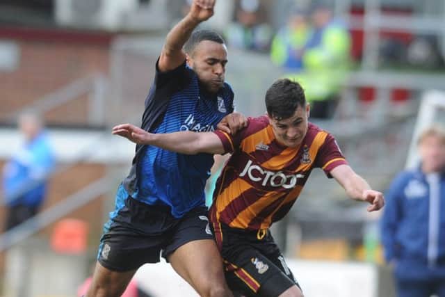 Nathan Thompson, left, in action against Bradford last season Picture: Yorksjire Post Newspapers