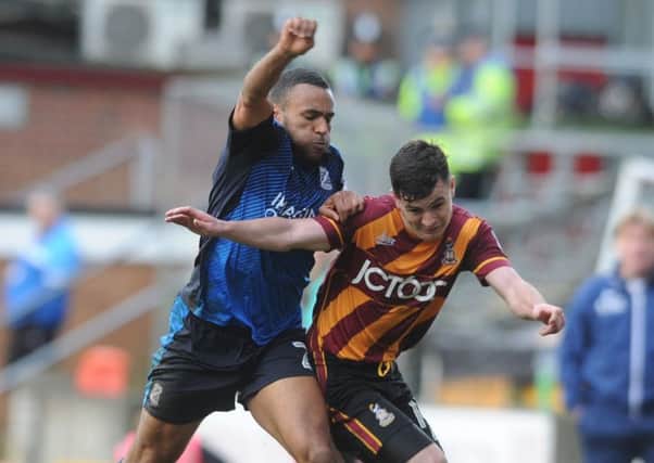 Nathan Thompson, left, in action against Bradford last season Picture: Yorksjire Post Newspapers