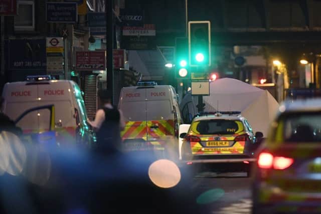 A police forensic tent is erected at the scene of the attack. Picture: PA