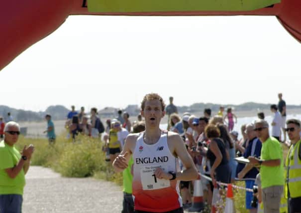 Alex Teuten won the Gosport Golden Mile with a new course record. Picture: Neil Marshall
