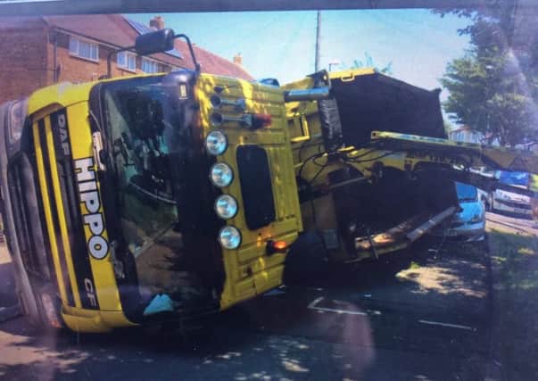 A Hippo waste lorry has overturned in Abbeydore Road, Paulsgrove

Picture: Hants Road Police / Twitter