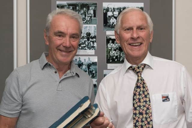 Steve Miller, who put the exhibition together, along with Ray Crawford and a rattle that saw action in the 1939 FA Cup final.     Picture: Keith Woodland