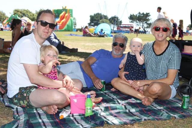 Andy Dickson and Lola, two, Michael Kays, 11-month-old Lily and Michelle Kays Picture: Habibur Rahman (170804-95)
