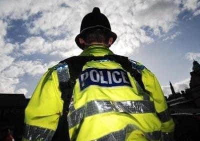 A woman has died on a West Sussex beach this afternoon