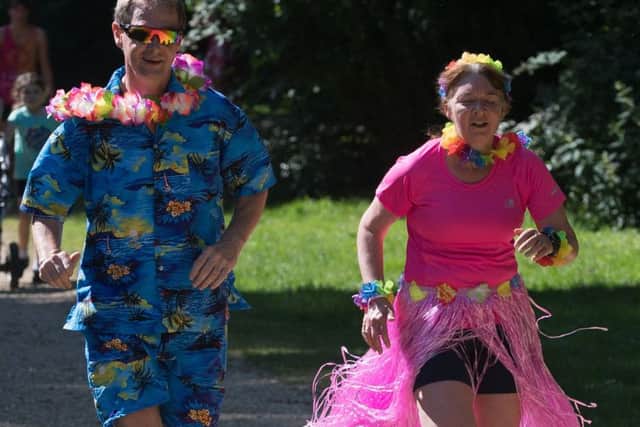 Ian Jones and Gissele Leishman during the Havant parkrun with Hawaii theme. Picture: Keith Woodland
