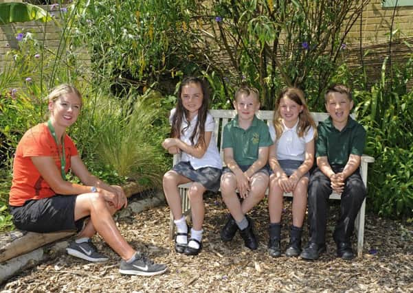 Left to right: Louise Moreton, 39, with pupils Keira Hall ,10, Keiran Robbins, eight, Ruby Ogden, eight, and Dylan Warner, nine. Picture by:  Malcolm Wells