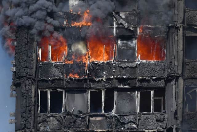 Smoke billows from Grenfell Tower 	             Picture PA