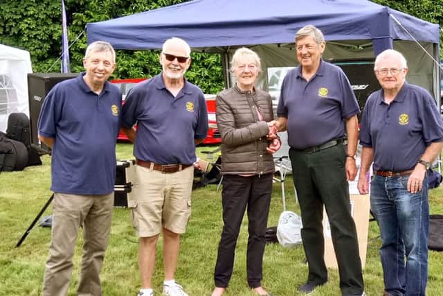 Waterlooville Rotary Club members, from left, Chris Nash, Ken Berry, Roy Wilding and Mike Williams with Liz Smout from the New Blendworth Centre thanking them for their fundraiisng