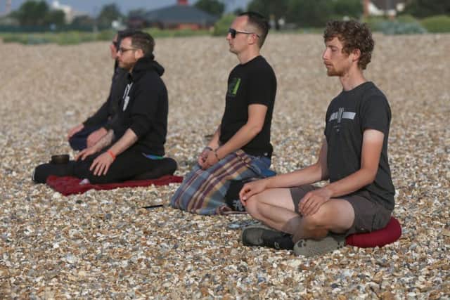 Andy Dixon, nearest camera, with other members on the beach at Eastney.