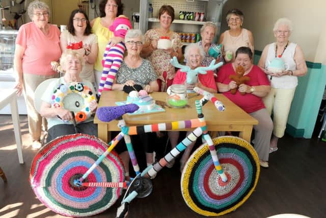 Coleen Bloom with the ladies who attend Knit and Natter Picture: Sarah Standing (170790-3797) PPP-170621-151249001