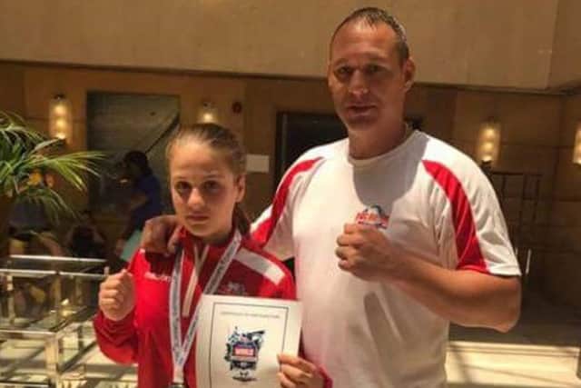 Annie Rosam, with her coach Dean Kendall