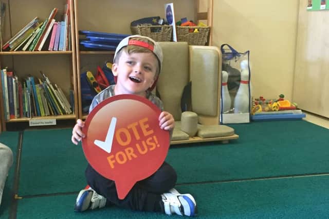 Frankie Duke, five, attends the Rainbow Centre and is urging supporters to vote