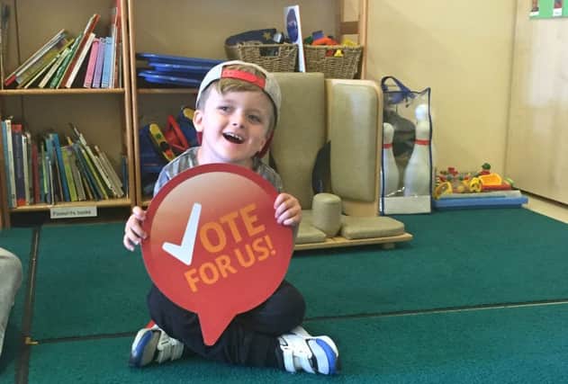 Frankie Duke, five, attends the Rainbow Centre and is urging supporters to vote
