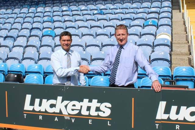 Portsmouth FC CEO Mark Catlin, left,  with Paul Barringer from Lucketts Travel