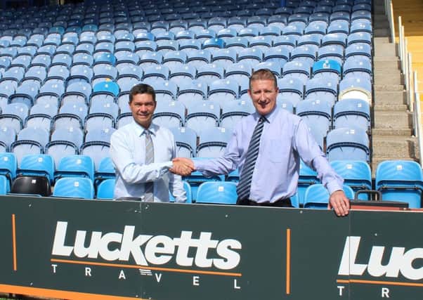 Portsmouth FC CEO Mark Catlin, left,  with Paul Barringer from Lucketts Travel
