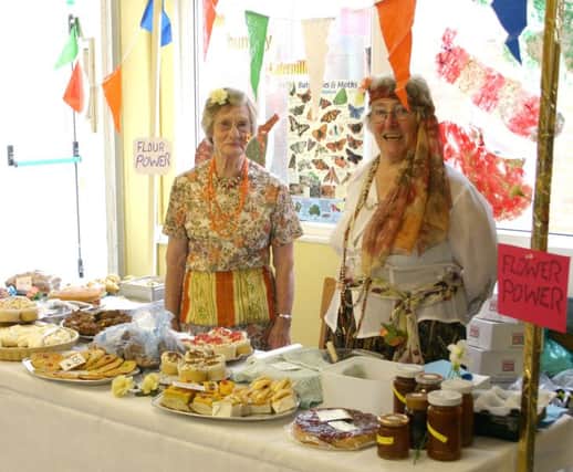 Worshippers looking after the cake stall last year