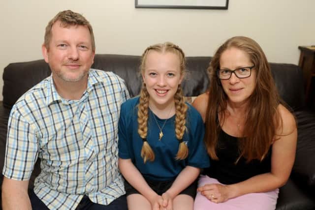 Gabby Bedford with her parents Ben and Sadie  Picture: Sarah Standing (170792-3907)