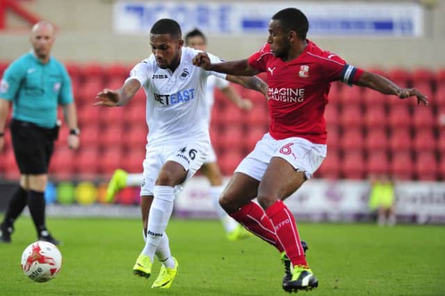 Nathan Thompson skippering Swindon Town