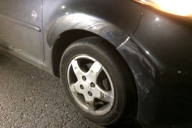 The damage to Michael and Roslyn Parsons' car after Roxanne Vines crashed into it