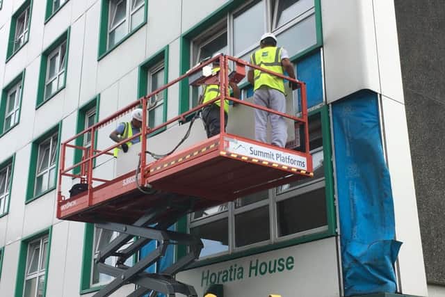 Cladding being taken off Horatia House in Somers Town Portsmouth