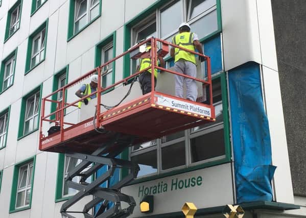 Cladding being taken off Horatia House in Somers Town Portsmouth