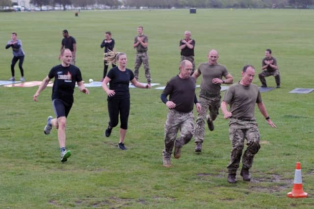 Army reserves from 295 Battery in Hilsea held a free PT session on Southsea Common Picture: Sarah Standing (160729-9518)
