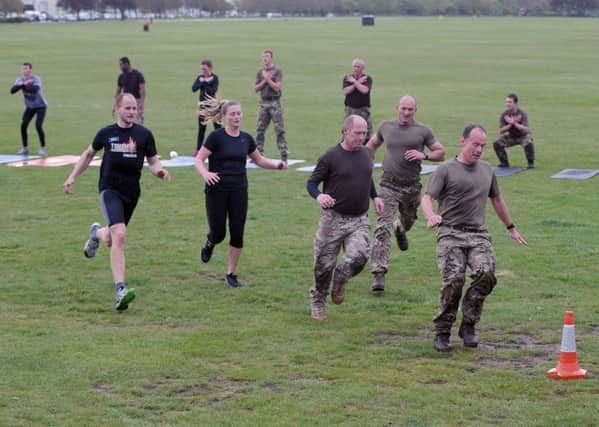 Army reserves from 295 Battery in Hilsea held a free PT session on Southsea Common Picture: Sarah Standing (160729-9518)