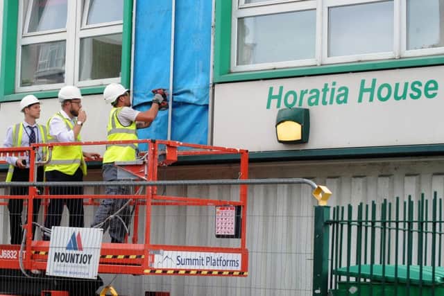 Cladding is removed from Horatia House   Picture: Sarah Standing (170831-9636)