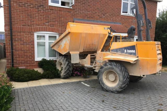 A dump truck was driven into a house in Whiteland Way, Clanfield this morning