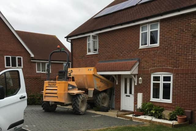A dump truck was driven into a house in Whiteland Way, Clanfield this morning