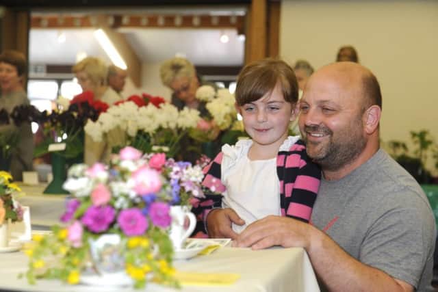 Steve Amos from Petersfield and his daughter Harriett (seven). [07789714771]Picture Ian Hargreaves  (170743-1) PPP-170624-190538006