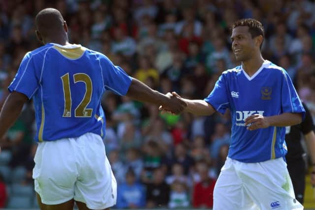 Geovanni, right, celebrates his goal on trial for Pompey with Noe Pamarot