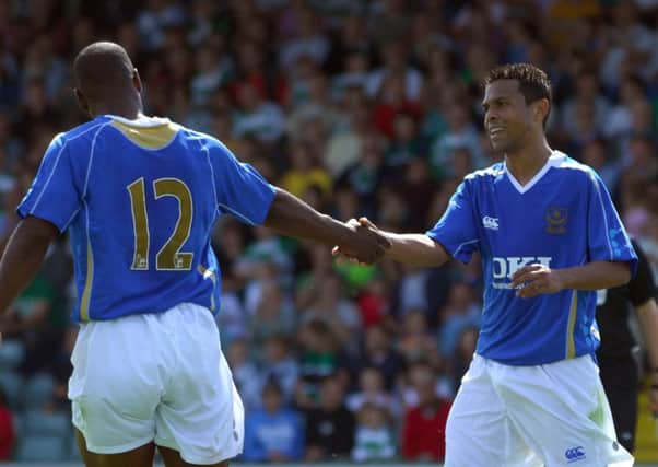 Geovanni, right, celebrates his goal on trial for Pompey with Noe Pamarot