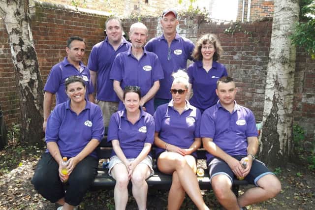 The Pfizer volunteers in the West Street home garden